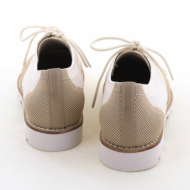 カチッとしがちなマニッシュもニット素材でこなれた雰囲気に